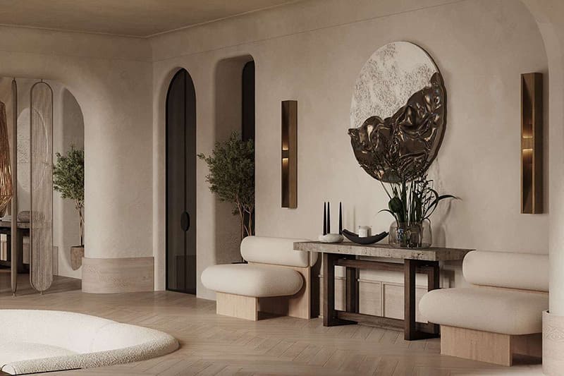 Nội thất gỗ sáng màu kết hợp tường bo cong nhẹ mang đến cảm giác ấm áp và mềm mại, phù hợp với phong cách Wabi Sabi hiện đại.