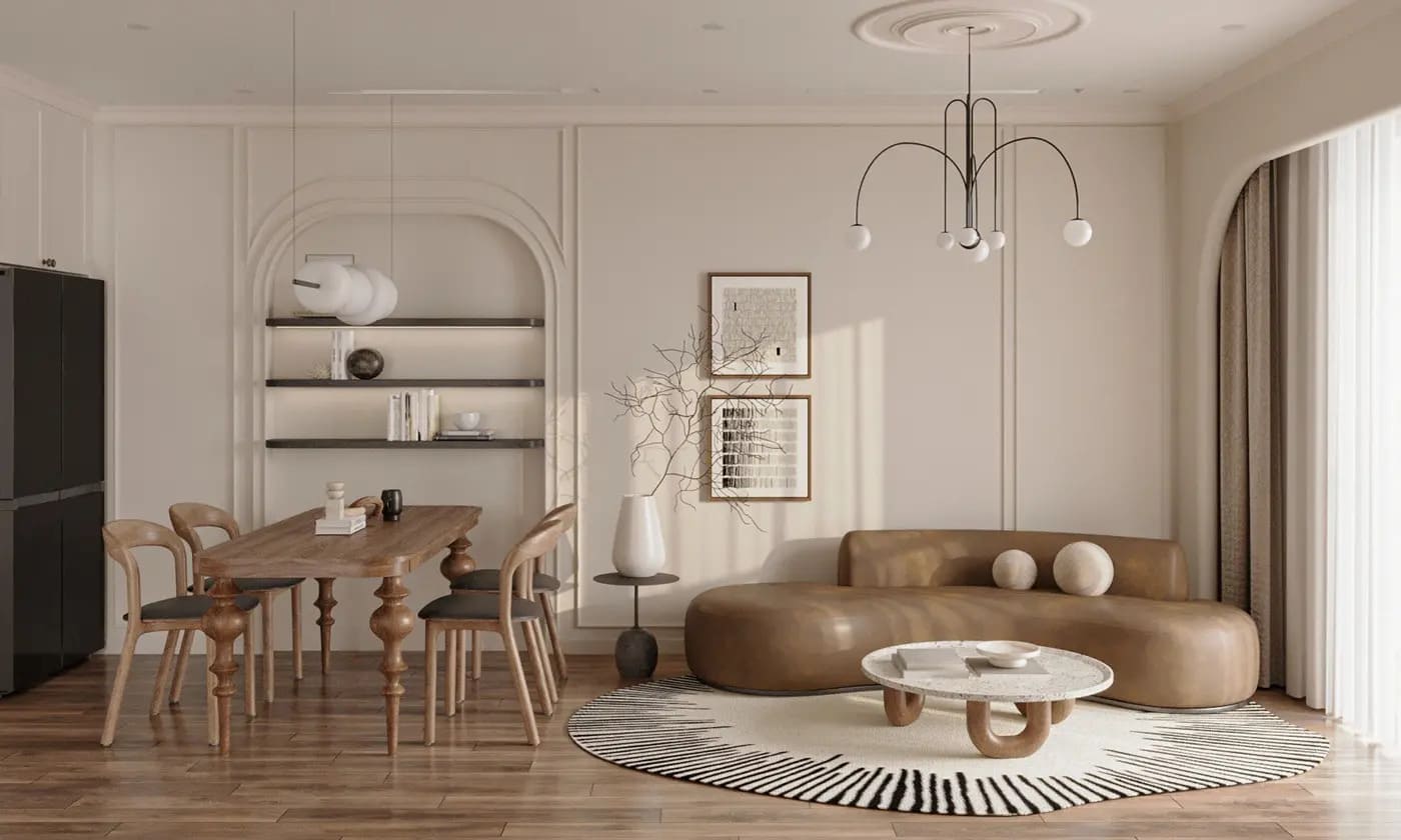 Các đường bo âm tường và thảm dệt tròn tạo nên điểm nhấn mềm mại, đồng thời giữ nguyên tinh thần mộc mạc của phong cách Wabi Sabi.