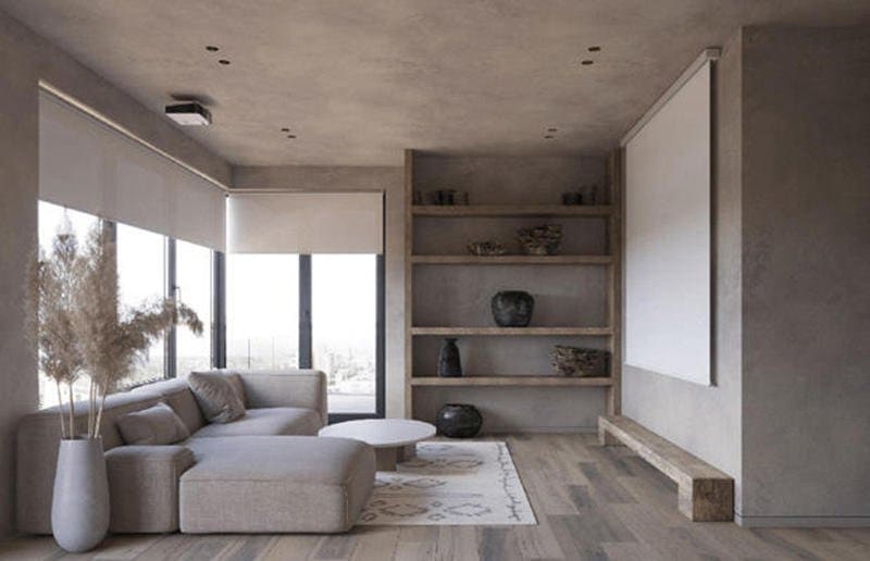 Tường hiệu ứng kết hợp ánh sáng hắt trần tạo cảm giác tĩnh lặng, trong khi nội thất bo cong giữ được nét mềm mại tự nhiên của phong cách Wabi Sabi.